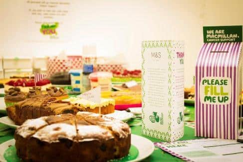 cakes on a table macmillan cake sale cortech